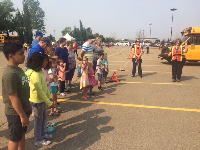 Children and families learn to ride the bus safely